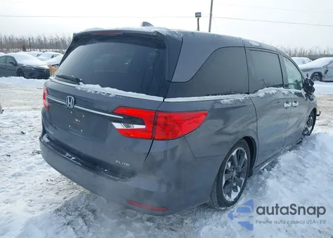 2021 Honda Odyssey Elite z USA, uszkodzony, nr VIN 5FNRL6H92MB011917